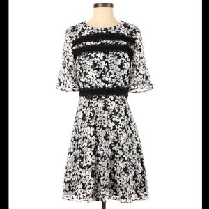 Cece black & white floral dress with elegant lace detail